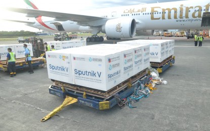 <p><strong>BIGGEST SHIPMENT.</strong> A total of 720,000 doses of the Sputnik V Covid-19 vaccine arrive at the Ninoy Aquino International Airport on Saturday (Oct. 16, 2021). The shipment is the most so far by the Gamaleya Research Institute and brought the country’s total of the Russian jabs to 1.3 million. <em>(PNA photo by Robert Oswald P. Alfiler)</em></p>