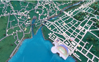 <p><strong>DEVELOPMENT.</strong> A diorama shows the map of Marawi City where current projects of Task Force Bangon Marawi are located. On Saturday (Oct. 16, 2021), the National Housing Authority showed the map to President Rodrigo Duterte, who attended the fourth anniversary of the city's liberation from Maute terrorists. <em>(PNA photo by Nef Luczon)</em></p>