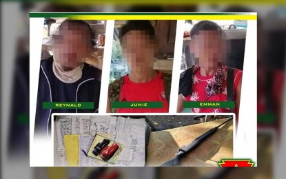 <p><strong>FALSE PROMISES.</strong> A suspected high-ranking leader of the New People's Army (NPA) and his two sons voluntarily surrendered to the Philippine Army and the police in Sta. Catalina, Negros Oriental on Sunday (Oct. 17, 2021). The three said the lack of support from their leaders and false promises by the NPA prompted them to return to the fold of law. <em>(Photo courtesy of the Philippine Army)</em></p>