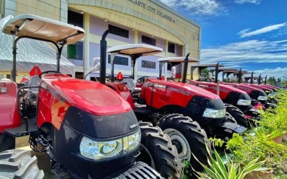 <p><strong>BDP PROJECT</strong>. The PHP20.695 million worth of farm tractors received by seven of the 14 insurgency-cleared villages in Escalante City, Negros Occidental from the Barangay Development Program in rites held on October 11. “The program gives us the encouragement to live peaceful, productive and progressive lives. We take this opportunity to express our recognition for what the BDP has accomplished in uplifting communities nationwide,” the barangay captains of the four recipient-villages said in a statement on Tuesday (Oct. 19, 2021).<br /><em>(Photo courtesy of 79IB, Philippine Army)</em></p>