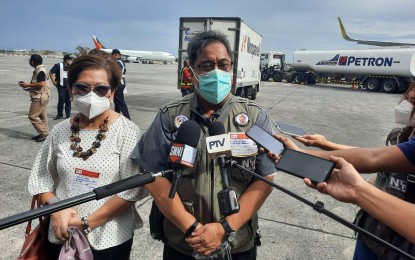 <p><strong>VAX DOSES FROM BRUNEI</strong>. Special Advisor to the National Task Force Against Covid-19 (NTF) Dr. Teodoro “Ted” Herbosa (right) and NTF Against Covid-19 medical consultant Dr. Maria Paz Corrales (left) speak to the media during the arrival of AstraZeneca vaccine from Brunei at the Ninoy Aquino International Airport (NAIA) Terminal 1 on Wednesday (Oct. 20, 2021). Herbosa said the 2,000 doses are just a portion of the 20,000 vaccines expected to be donated by Brunei government. <em>(Photo by Raymond Carl Dela Cruz)</em></p>
