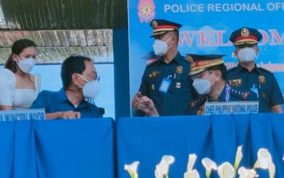 <p><strong>VISITING.</strong> Police Gen. Guillermo Lorenzo T. Eleazar (sitting, right), chief of the Philippine National Police, shares his thoughts to Opol, Misamis Oriental Mayor Max Seno after the signing of a Deed of Donation at the Regional Headquarter Grandstand at Camp Alagar here, Oct. 21, 2021. Less than a month before he retires, Eleazar took time to visit the police headquarters in Northern Mindanao for the first time. <em>(PNA photo by Ercel Maandig)</em></p>