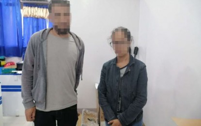 <p><strong>NEW LIFE.</strong> An NPA couple, identified only through their aliases “Amad/Saijie”, 34 (left), and “Nam/Xian”, 33, of the New People’s Army’s North Central Mindanao Regional Committee, have finally abandoned their communist ideology and yielded to the Agusan del Sur Police on Wednesday (Oct. 20, 2021). The couple decided to renew their lives after seeing the government’s sincerity in providing opportunities to former rebels. <em>(Photo courtesy of PRO-13)</em></p>