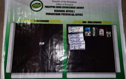 <p><strong>BUSTED.</strong> Authorities confiscate PHP7,749 worth of suspected shabu from a high-value target (HVT) in Dagupan City, Pangasinan on Friday (Oct. 22, 2021). He was the second HVT arrested in the province this week. <em>(Photo courtesy of PDEA Pangasinan)</em></p>
