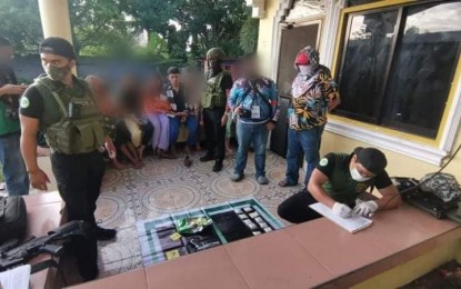 <p><strong>NABBED.</strong> Law enforcers account for the illegal drugs seized from a mayoral aspirant in Maguindanao, identified as Tom Nandang, during an anti-drug operation in his temporary residence in Midsayap, North Cotabato on Thursday (Oct. 21, 2021). The PNP is now tracking the suspect's cohorts to determine the scope of his drug activities. <em>(Photo courtesy of PDEA)</em></p>