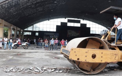 <p><strong>ILLEGAL MUFFLERS</strong>. Illegal “open pipe” motorcycle mufflers confiscated in Silay City, Negros Occidental were destroyed at the city plaza on Friday (Oct. 22, 2021). Lt. Col. Robert Petate, chief of Silay City Police Station, said the use of modified mufflers is a violation of City Ordinance 2, series of 2012. <em>(Photo from Mayor Mark J. Golez Facebook page)</em></p>