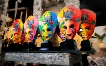 <p><strong>VIRTUAL TOUR.</strong> The colorful MassKara tokens are among those featured in the Bacolod City promotional video dubbed “Smile, you’re in Bacolod! uploaded on YouTube on Monday (Oct. 25, 2021). The video, co-produced by the Department of Tourism-Western Visayas, is being launched on the week of what is supposed to be the highlights of the annual MassKara Festival. <em>(Screenshot from Bacolod City Tourism Office YouTube video)</em></p>