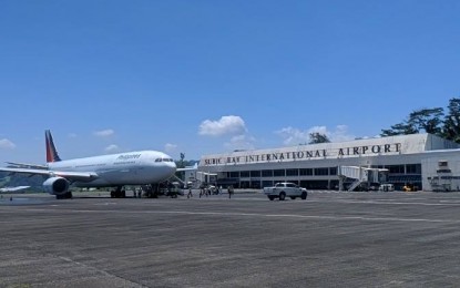 <p><strong>GLOBAL GATEWAY</strong>. The use of Subic Bay International Airport (SBIA) as an alternate port of entry for the government’s OFW Repatriation Program since July this year has resulted in increased international aircraft and passenger movements, as well as improved income for the airport. In the third quarter of 2021 alone, the OFW flights had provided the Subic airport PHP1.6 million in direct income, as well as PHP218.7 million in income for Subic hotels. <em>(File photo by SBIA)</em></p>