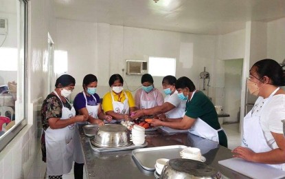 <p><strong>BUSINESS VENTURE.</strong> Members of Punta Bilar Women’s Association (PBWA) in Surigao City undergo a four-day meat processing training by the Livestock Program of the Department of Agriculture (DA) in Region 13 (Caraga). The PBWA, a recipient of the PHP444,000 livelihood aid from the Department of Social Welfare and Development, will venture into selling processed meat products through their sundry store business. <em>(Photo courtesy of DA-13)</em></p>
