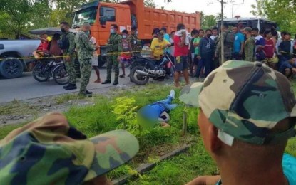 <p><strong>AMBUSHED.</strong> A Maguindanao village councilman gets killed along with his companion at the section of the national highway in Barangay Makir, Datu Odin Sinsuat, Maguindanao on Tuesday afternoon (Oct. 26, 2021). Authorities are still conducting follow-up operations to determine the motive of the attack. <em>(Photo courtesy of DXMS Radyo Bida)</em></p>