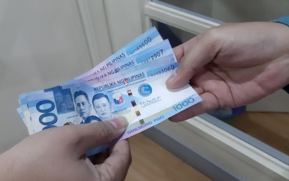 <p><strong>PESO WEAKNESS.</strong> The depreciation of the peso against the US dollar can compensate for the impact of higher prices on the spending capacity of most consumers. This, as the stronger dollar translates to more peso value for remittances sent by overseas Filipino workers, among others. <em>(PNA file photo)</em></p>