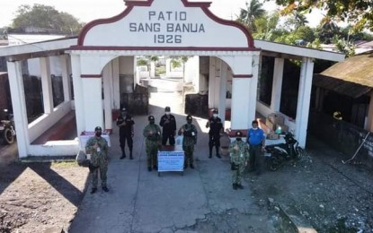 <p><strong>CRIME WATCH</strong>. Personnel of Bago City Police Station and force multipliers in Bago City, Negros Occidental patrol the city’s public cemetery during the All Saints’ Day on Nov. 1, 2021. Crimes dropped by 43.32 percent in Western Visayas from October 29 to November, data released by the Police Regional Office-6 on Wednesday (Nov. 3, 2021) showed. <em>(Photo courtesy of Bago City Information Office)</em></p>