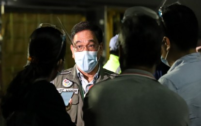 <p><strong>EYEING TO VACCINATE 5M</strong>. National Task Force Against Covid-19 head of strategic communications on current operations, Assistant Secretary Wilben Mayor, replies to questions from the media during the arrival of 866,970 doses of Pfizer vaccine at the Ninoy Aquino International Airport Terminal 3 in Pasay City on Friday (Nov. 5, 2021). Mayor said the government aims to inoculate five million people in the three-day "National Vaccination Day" this November. <em>(PNA photo by Robert Oswald P. Alfiler)</em></p>