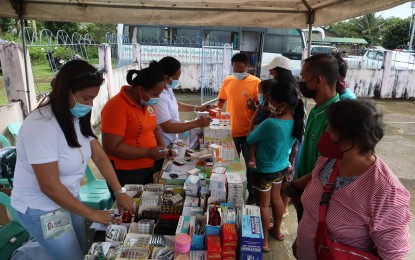 <p><strong>MEDICAL SERVICES.</strong> Residents of Basay, Negros Oriental line up for free medicines during a medical mission conducted by the provincial government in October 2021. The medical missions, headed by Governor Roel Degamo, aim to complement the efforts of the national government in fighting the communist insurgency in the province. <em>(Photo from the Facebook page of the Negros Oriental provincial government)</em></p>