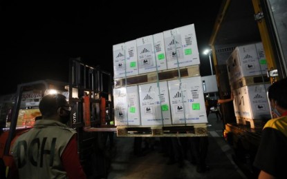 <p><strong>STEADY VAX DELIVERY.</strong> Another 866,970 doses of Pfizer-BioNTech vaccine arrive at the NAIA T3 on Wednesday (Nov. 10, 2021) night. The latest delivery is the second of over 1.73 million doses procured by the government and shipped within two days. <em>(PNA photo by Avito C. Dalan)</em></p>