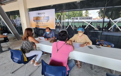 <p><strong>ON-SITE JABS.</strong> Negros Oriental Assistant Provincial Health Officer Dr. Liland Estacion (right) leads the vaccination of call center employees in Dumaguete City on Saturday (Nov. 13, 2021). It was the first time for the provincial government to hold an on-site vaccination activity for a private firm. <em>(Photo courtesy of Qualfon/Joslyn Canon)</em></p>