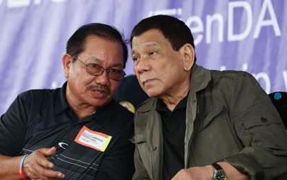 <p>Former Mindanao Development Authority (MinDA) chief Emmanuel Piñol (chief) and President Rodrigo Duterte <em>(PNA file photo)</em></p>