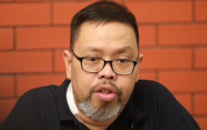 <p><strong>FINAL DAY.</strong> Comelec spokesperson James Jimenez answers queries from the media after the final day of the filing of statements of withdrawal and substitution at the Comelec office in Intramuros, Manila on Monday (Nov. 15, 2021). He said more than half of the 97 presidential aspirants may be removed for being nuisance candidates. <em>(PNA photo)</em></p>