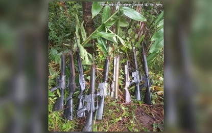 <p><strong>EXCAVATED</strong>. At least nine high-powered firearms placed inside a drum were excavated in the forested portion of Sitio Eme of Barangay Bagong Silang in Del Gallego, Camarines Sur last week. The dug-up firearms were five M16 and two M14 rifles; an M79 grenade launcher; and an M72 light anti-tank weapon. <em>(Photo courtesy of 9th Infantry Battalion)</em></p>