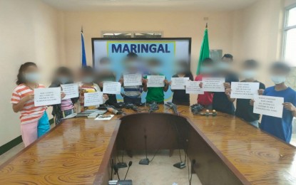 <p><strong>COLLAPSE.</strong> Eleven members of the New People's Army surrender to the Army in Maramag, Bukidnon on Wednesday (Nov. 7). Maj. Gen. Romeo Brawner Jr., commander of the 4th Infantry Division, said the surrender has led to the dismantling of the Guerrilla Front Malayag. <em>(Photo courtesy of 4ID)</em></p>