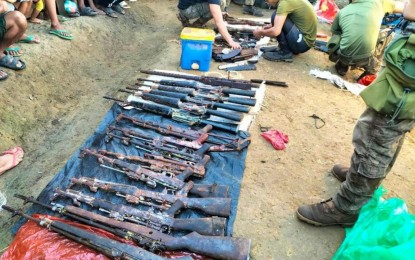 <p><strong>RECOVERED.</strong> Soldiers of the Army’s 39th Infantry Battalion in Makilala, North Cotabato prepare the firearms seized from communist rebels for presentation to the media. The guns, seized during the series of military operations between Nov. 11 and 16, belonged to the New People's Army unit under the Far South Mindanao Region. <em>(Photo courtesy of 39IB)</em></p>
