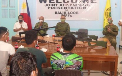 <p><strong>RIGHT CHOICE.</strong> Former Bangsamoro Islamic Freedom Fighters (BIFF) bandits listen as Colonel Jovencio Gonzales, commander of 602nd Army Brigade, presented them Tuesday (Nov. 23) to Midsayap town officials in North Cotabato following their surrender to the Army’s 34th Infantry Battalion in the area. The surrendering BIFF batch also turned in four high-powered firearms. <em>(Photo courtesy of 34IB)</em></p>