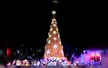 <p><strong>TREE OF HOPE.</strong> The 40-foot Christmas tree of the city of Manila lights up near the Kartilya ng Katipunan monument on Monday night (Nov. 22, 2021). Residents who witnessed the lighting ceremony expressed hopes for a merrier Christmas and safer 2022. <em>(Photo courtesy of Department of Tourism, Culture and Arts of Manila)</em></p>