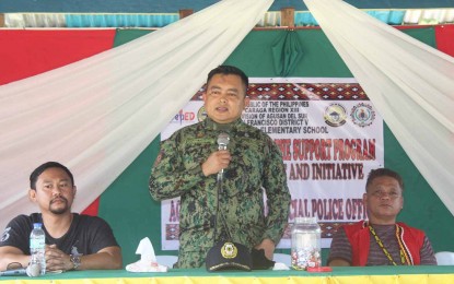 <p><strong>SCHOOL FOR IP KIDS.</strong> Col. Ruben Delos Santos (center), the director of Agusan del Sur Police Provincial Office, leads the turnover of a two-classroom building for the pupils of Sitio, Durian, an IP community in Barangay Lucac, San Francisco town on Tuesday (Nov. 23, 2021). The school facility, formally received by Datu Abog Makabuhay Maguinda (right) and other school officials in the area, was built through the support of the town government and the private sector. <em>(Photo courtesy of Agusan del Sur Pulis FB page)</em></p>