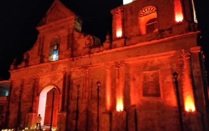 <p><strong>RED WEDNESDAY.</strong> The St. Nicolas of Tolentino Parish Church in Dauin, Negros Oriental is lit up in red in this file photo taken in 2020 to celebrate Red Wednesday. The event is held to pay tribute to the persecuted Christians and the suffering church. <em>(Photo courtesy of the St. Nicolas de Tolentino Parish)</em></p>