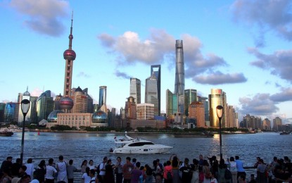 <p>People enjoy the view of Lujiazui at the Bund in east China's Shanghai, Aug. 2, 2019.<em> (Xinhua/Chen Fei)</em></p>