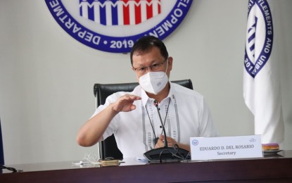 <p><strong>SETTING DIRECTION.</strong> Housing Secretary Eduardo del Rosario presides over the third meeting of the National Human Settlements and Urban Development Coordinating Committee at the Central Office boardroom on Tuesday (Nov. 23, 2021). Del Rosario also gave his guidance on how to encourage more LGUs to finalize their Local Shelter Plans and push for their housing projects. <em>(Photo courtesy of DHSUD)</em></p>