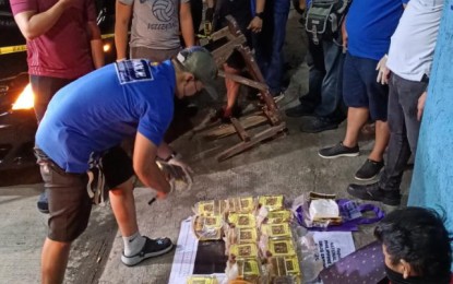 <p><strong>NABBED.</strong> Police and anti-narcotics agents arrested a drug suspect and seized PHP102 million worth of shabu in a buy-bust operation in Caloocan City Monday (Nov. 29, 2021). The suspect is working for a Chinese personality, identified only as alias "Lim" whom authorities described as a distributor of illegal drugs in the National Capital Region and nearby areas, police said.<em> (PNP photo)</em></p>
