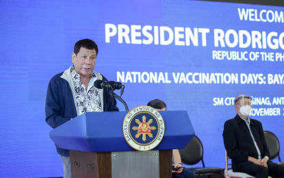 <p><strong>BAKUNAHAN 2021</strong>. President Rodrigo Roa Duterte delivers his speech during the launching of the National Vaccination Days: Bayanihan Bakunahan 2021, a three-day nationwide campaign that aims to inoculate millions of Filipinos, at SM City Masinag in Antipolo City, Rizal on Nov. 29, 2021. Duterte expects the Philippines to achieve its Covid-19 vaccination target before the end of the year. <em>(Presidential photo by Robinson Niñal)</em></p>