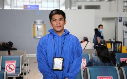 <p>NAIA Terminal 2 building attendant Jhun Telewik (<em>Photo courtesy of Manila International Airport Authority</em>) </p>