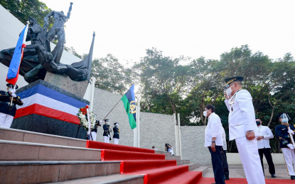 <p><strong>WREATH-LAYING</strong>. Armed Forces of the Philippines (AFP) Chief of Staff, Lt. Gen. Andres Centino (in white uniform), joins President Rodrigo R. Duterte during the wreath-laying ceremony at the Pinaglabanan Shrine in San Juan City on Tuesday (Nov. 30, 2021) to pay homage to Gat Andres Bonifacio and other heroes of the Katipunan during the 158th birth anniversary of Bonifacio. Centino called on all AFP members to get inspiration from Bonifacio’s patriotism and heroism. <em>(Presidential photo by Ace Morandante)</em></p>