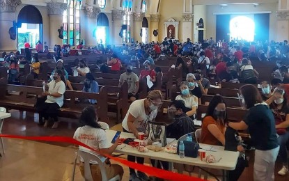 <p><strong>VAX SITE.</strong> The Sacred Heart of Jesus Parish Church in Kamuning, Quezon City conducts vaccination against Covid-19 in this July 2021 photo. The Catholic Church said it will continue offering facilities to aid the government’s vaccination program. <em>(Photo courtesy of Sacred Heart Parish/CBCP)</em></p>