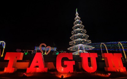 <p><strong>TALLEST HOLIDAY TREE.</strong> The tallest Christmas tree in the Philippines lights up in Tagum City, Davao del Norte on Wednesday night (Dec. 1, 2021). The Christmas tree was adorned with 6,255 multi-colored bulbs and has a design that advocates for simplicity, durability, and resiliency despite the battle against the pandemic. <em>(Photo courtesy of Tagum City Information Office)</em></p>