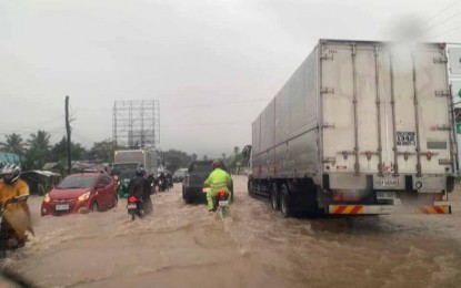<p><strong>FLOODED STREETS.</strong> Floodwaters start to engulf some major streets in Butuan City as heavy rains hit the city on Friday (Dec. 3, 2021) due to the trough of Typhoon Nyatoh. The city government also reported the evacuation of at least 100 families from Barangay Bancasi due to flooding. <em>(Photo courtesy of PIA Agusan del Norte)</em></p>
