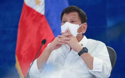 <p><strong>DIVINE INTERVENTION</strong>. President Rodrigo Roa Duterte delivers his public address on government’s response against Covid-19 pandemic on Monday night (Dec. 6, 2021). Duterte said he is praying to God that Omicron variant of Covid-19 won’t reach the Philippines. <em>(Presidential photo by Toto Lozano)</em></p>