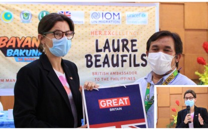 <p><strong>HEALTH SUPPORT.</strong> Dr. Ameril Usman, the Ministry of Health-Bangsamoro Autonomous Region in Muslim Mindanao (MOH-BARMM) director-general, hands over a present to UK Ambassador Laure Beaufils during the latter’s visit to the BARMM government center in Cotabato City on Tuesday (Dec. 7, 2021). The UK envoy (inset) reiterated her government’s support to the BARMM’s fight against the coronavirus disease 2019 and its other health programs. <em>(Photo courtesy of MOH-BARMM)</em></p>