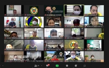 <p><strong>BRACING FOR OMICRON.</strong> Philippine Army (PA) officials hold a virtual meeting on the preparations to deal with a possible surge in cases due to the Omicron variant of Covid-19, on Tuesday (Dec. 7, 2021). The PA is implementing a "no vaccination, no entry" rule in its headquarters.<em> (Photo courtesy of Philippine Army)</em></p>