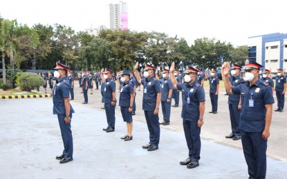 <p><strong>NEW OFFICERS.</strong> The Philippine National Police hired 166 professionals, capped by an oath-taking ceremony at the Camp Crame national headquarters in Quezon City on Monday (Dec. 13, 2021). Among the new hires are a doctor, a nurse, and a nutritionist. <em>(Photo courtesy of PNP Facebook)</em></p>