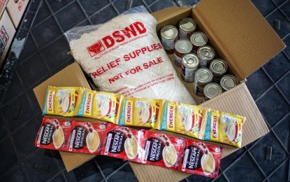 <p><strong>FOOD PACK.</strong> A family food pack (FFPs) contains 6 kg. of rice, 10 canned goods, 5 sachets of coffee, and 5 sachets of cereal drink, enough to sustain a family of five for two days. More than PHP2 million worth of FFPs were distributed to families affected by the El Niño phenomenon in 14 municipalities in Masbate province, the Department of Social Welfare and Development in Bicol said Wednesday <em>(June 26, 2024). (PNA file photo)</em></p>