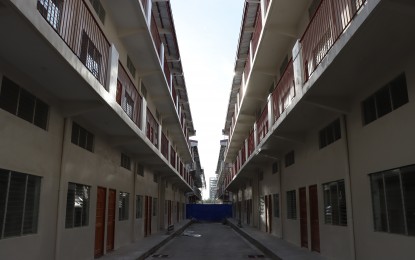 <p><strong>NEW HOUSING PROJECT</strong>. The government starts handing over 1,440 housing units at the Ciudad de Strike Phase I in Bacoor, Cavite. Beneficiaries of this project are informal settler families identified by the local government of Bacoor.<em> (Photo courtesy of DSHUD)</em></p>