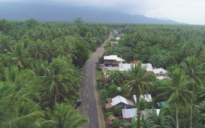 <p><strong>ROAD PROJECT. </strong> The Department of Public Works and Highways (DPWH), through its Sorsogon 2nd District Engineering Office, completes the PHP20-million paved road project in Barcelona town in Sorsogon province in this undated photo. The project is part of the Ariman Junction-Bulusan Lake Road connecting Barcelona and Bulusan towns classified and designated as tourism hubs in Sorsogon.<em> (Photo courtesy of DPWH Bicol Facebook page)</em></p>