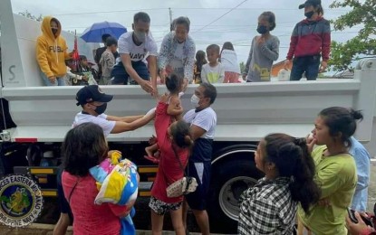 <p><strong>TO THE RESCUE.</strong> Troops from the disaster response and rescue team of the Naval Forces Eastern Mindanao assist in the conduct of preemptive evacuation of residents in low-lying areas in Surigao City on Thursday (Dec. 16, 2021). Military units are now conducting disaster response operations in areas battered by Typhoon Odette. <em>(Photo courtesy of Naval Forces Eastern Mindanao)</em></p>
