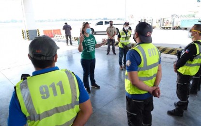 <p><strong>HELP FOR BOHOL</strong>. Davao City Mayor Sara Duterte gives last-minute instructions to the rescue and medical teams the city government dispatched to Bohol, one of the provinces battered by Typhoon Odette, on Sunday (Dec. 19, 2021). The delegation is headed to the municipality of Ubay.<em> (Photo from the City Government of Davao's Facebook Page)</em></p>