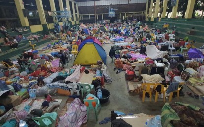 <p><strong>REFUGE.</strong> Evacuees in Barangay Carmen, Cagayan de Oro City seek temporary refuge at West City Central School on Dec. 16 as Typhoon Odette lashes Northern Mindanao. The Regional Disaster Risk Reduction and Management Council tallied more than 53,000 displaced individuals and PHP81-million worth of damage to property as of Sunday (Dec. 19, 2021) evening. <em>(PNA photo by Nef Luczon)</em></p>