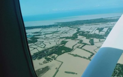 <p><strong>FLOODED</strong>. An aerial shot of flooded areas in southern Negros Occidental after the onslaught of Typhoon Odette, taken during a damage assessment on Dec. 18, 2021. The provincial government has reported 33 casualties and an estimated PHP5.982 billion in damage across various sectors as of Monday (Dec. 20, 2021).<em> (Photo courtesy of Philippine Coast Guard-Negros Occidental)</em></p>