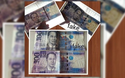 <p><strong>FAKE</strong>. Undated photo shows fake and genuine P100 bills. The police chief in Bicol on Tuesday (Dec. 21, 2021) warned the public against counterfeit money that could be circulating in the region, particularly in busy public markets. <em>(Photo courtesy of PRO5 PIO)</em></p>